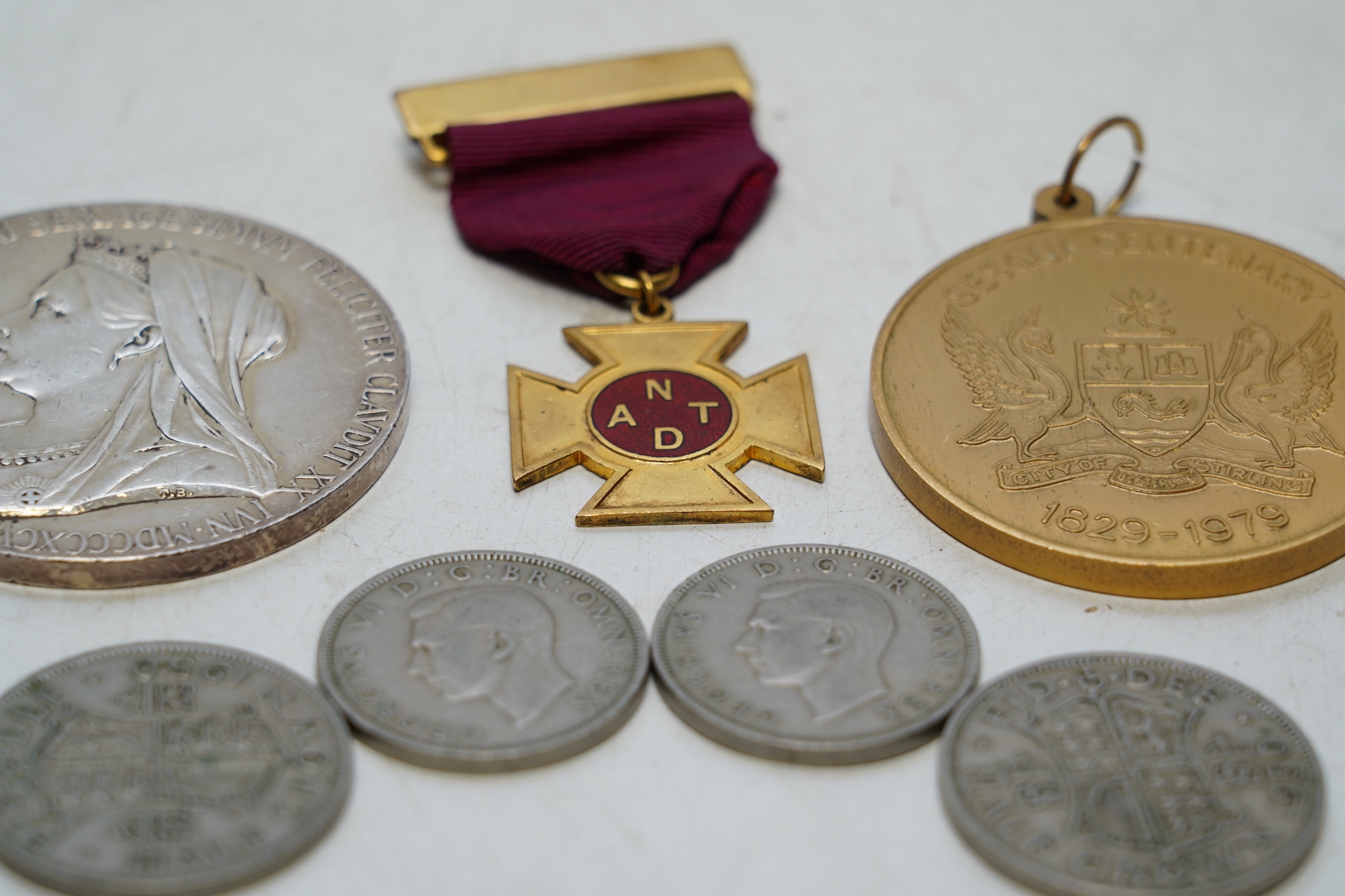 Assorted coins including pre 1947 examples and medals, including a Queen Victoria diamond Jubilee silver large silver medal. Condition - fair